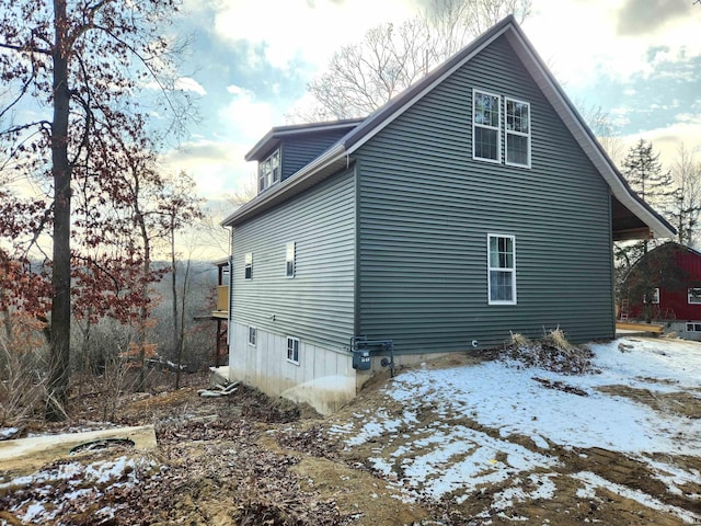 view of snow covered property