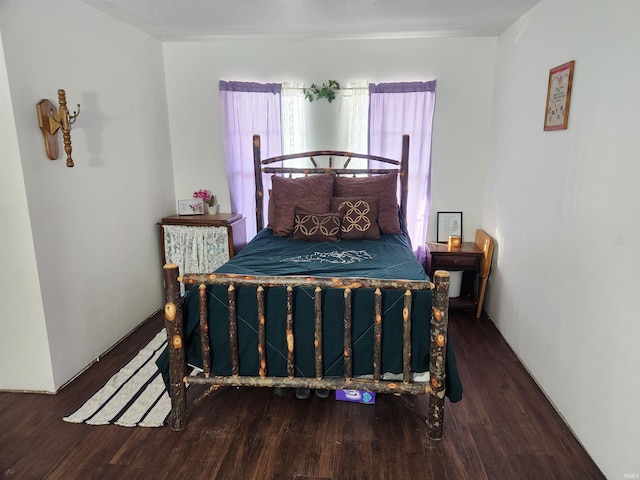 bedroom featuring wood finished floors