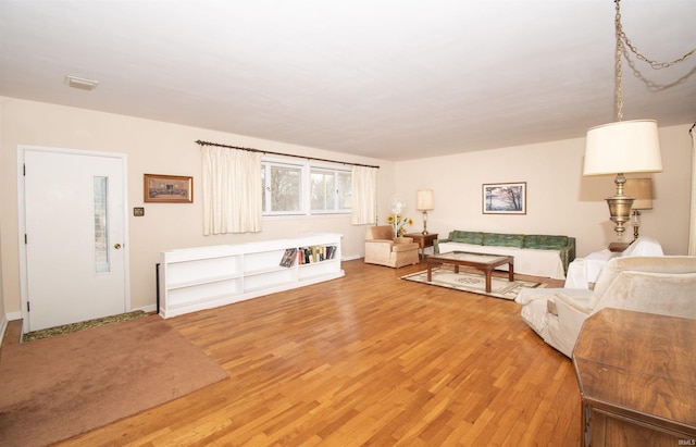 living area featuring light wood-style floors