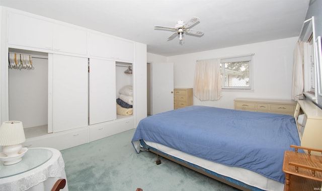 bedroom featuring a closet, carpet, and a ceiling fan