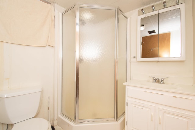 full bath featuring visible vents, a shower stall, toilet, and vanity