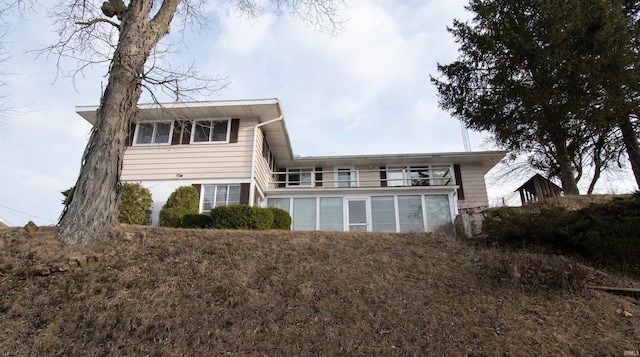 rear view of house with a balcony