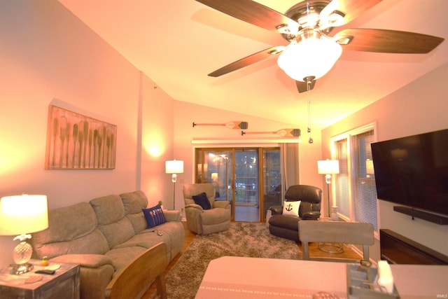 living room with lofted ceiling and a ceiling fan