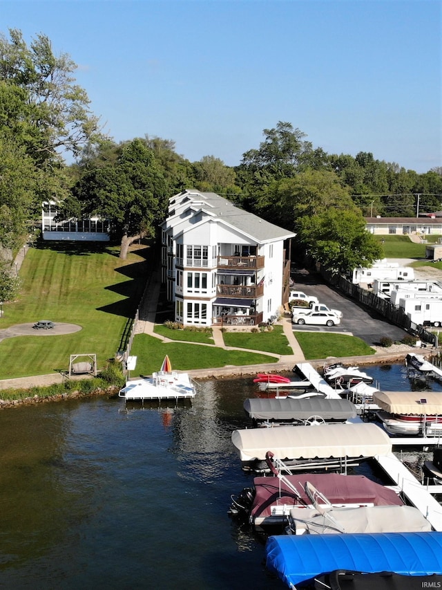 drone / aerial view with a water view