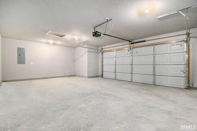 garage featuring electric panel and a garage door opener