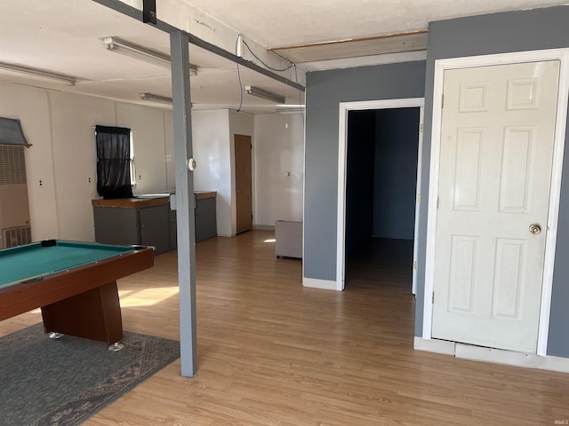 recreation room with light wood finished floors and billiards