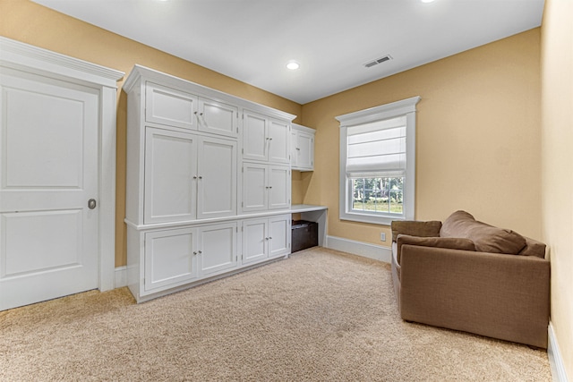 sitting room featuring carpet, visible vents, baseboards, and recessed lighting