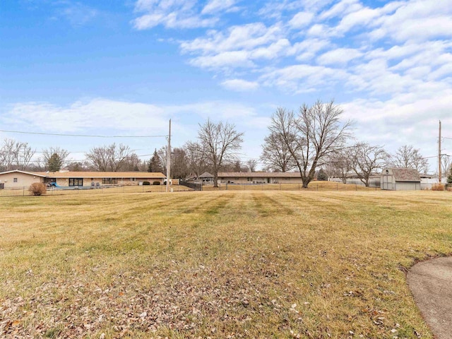 view of yard with fence