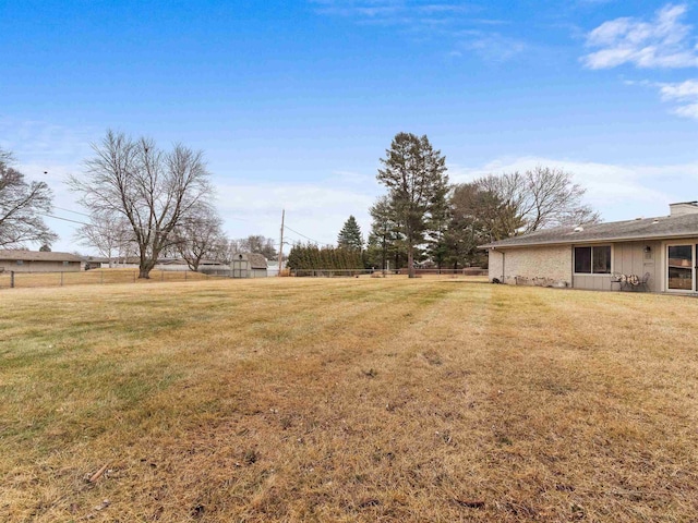 view of yard featuring fence