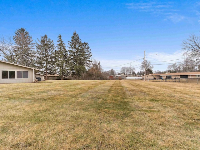 view of yard featuring fence