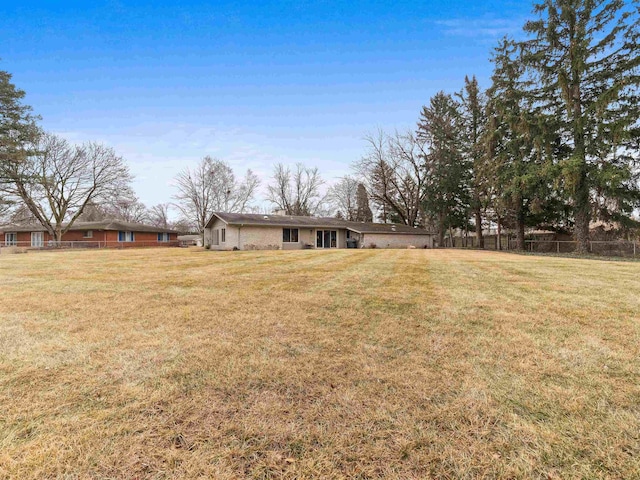 view of yard with fence