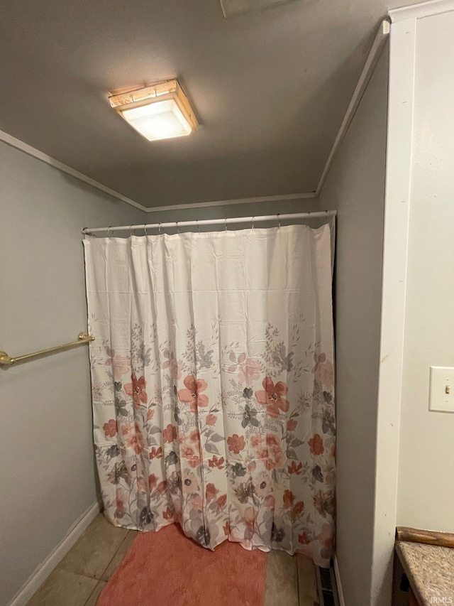 full bath with crown molding, visible vents, and tile patterned floors