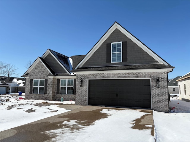 view of front of house featuring brick siding