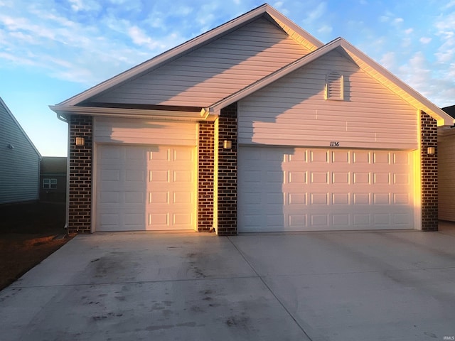 garage with driveway