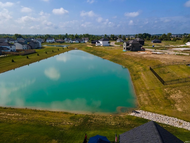 aerial view with a water view and a residential view