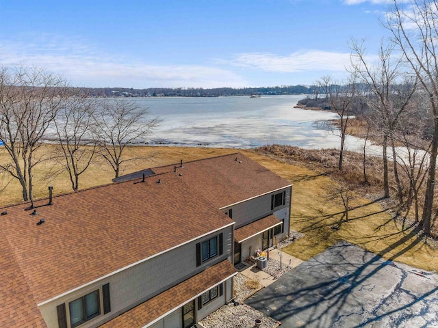 drone / aerial view with a water view