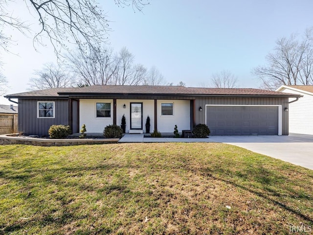 ranch-style home with a garage, board and batten siding, concrete driveway, and a front yard