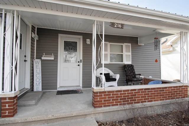 doorway to property with a porch