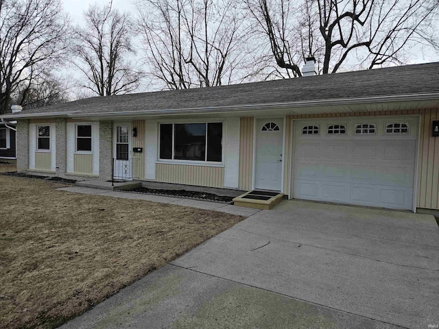 single story home featuring a garage, concrete driveway, brick siding, and roof with shingles