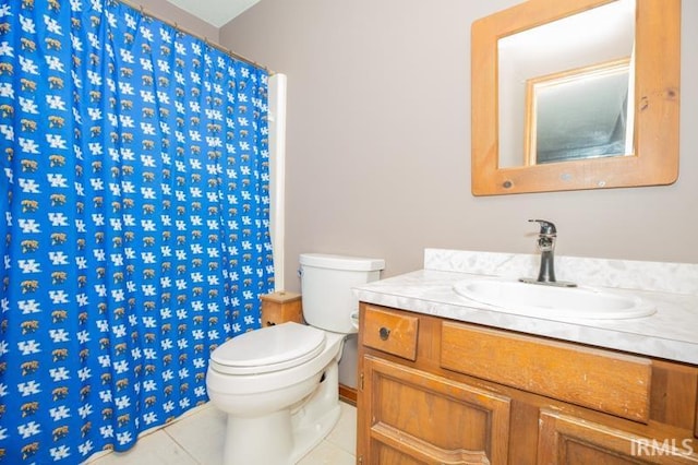 full bathroom with vanity, tile patterned flooring, toilet, and a shower with curtain