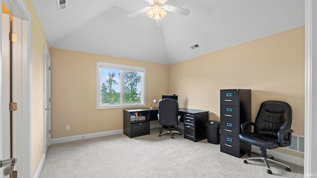 home office with light carpet, baseboards, visible vents, and lofted ceiling