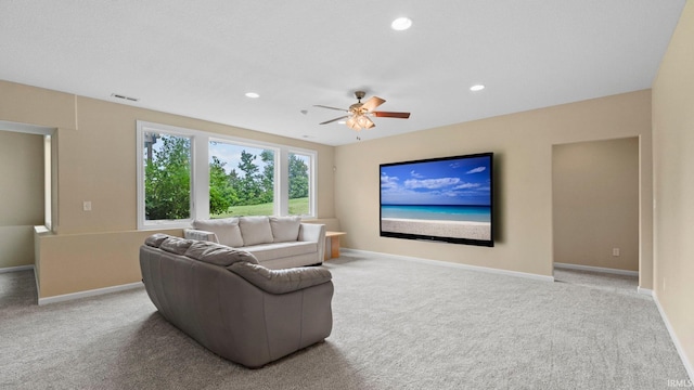 carpeted living area featuring baseboards, visible vents, a ceiling fan, and recessed lighting