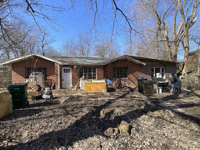 back of property with brick siding