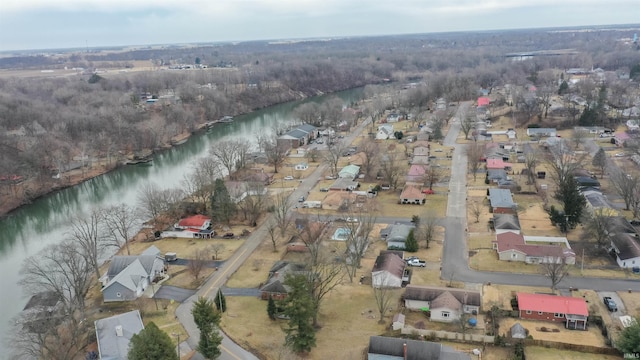 bird's eye view featuring a water view and a residential view