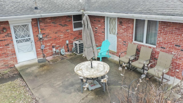 view of patio with central AC unit