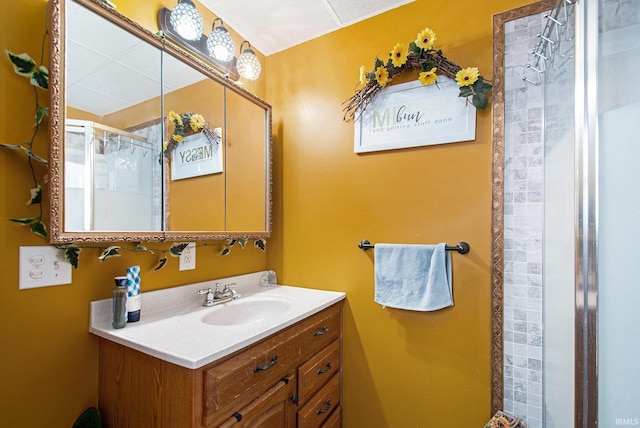 full bathroom with walk in shower and vanity