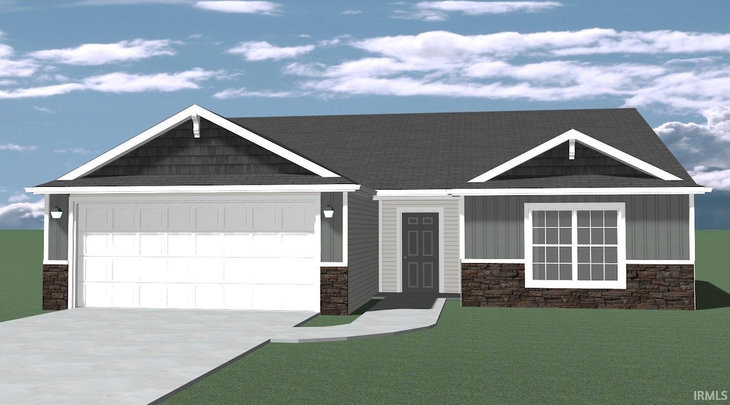 view of front of home featuring board and batten siding, stone siding, an attached garage, and concrete driveway