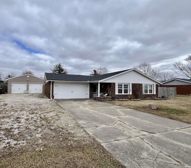 ranch-style house with an attached garage, a front yard, and brick siding