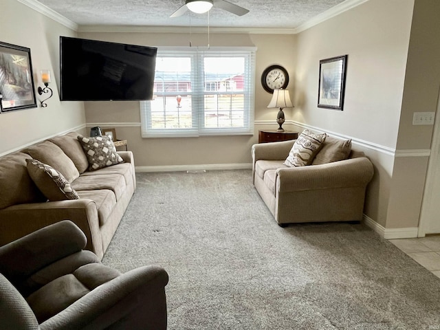 carpeted living room featuring ornamental molding, a textured ceiling, and baseboards