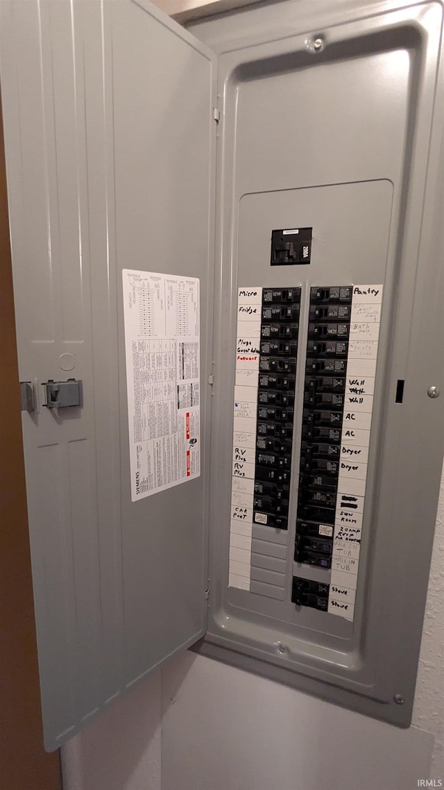 utility room featuring electric panel