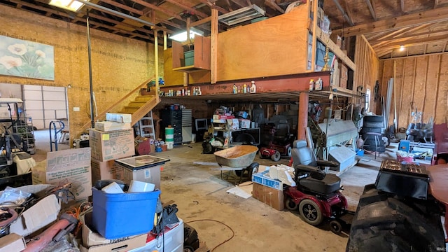 interior space featuring unfinished concrete flooring