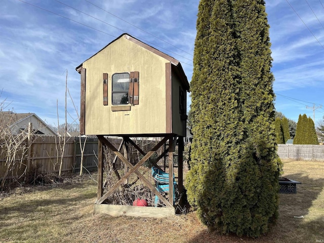 view of outdoor structure with fence