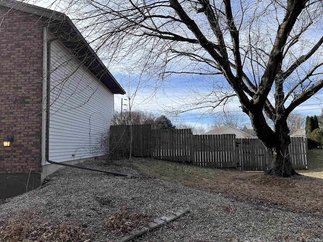 view of yard featuring fence