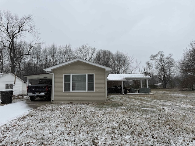 view of front of house with a carport