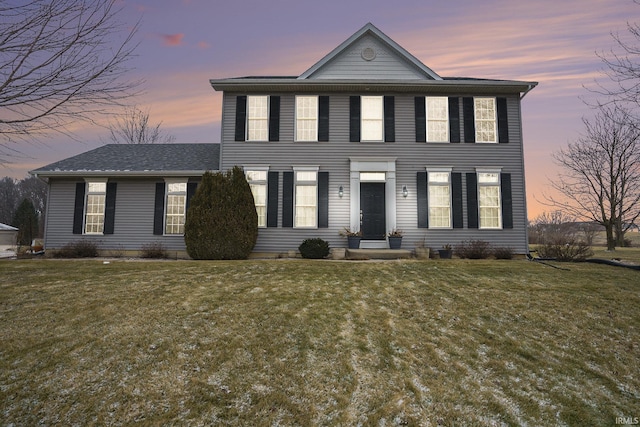 view of front of home featuring a yard