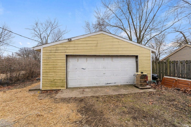 detached garage with fence