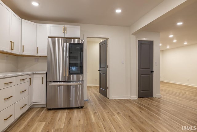 kitchen with light wood-style floors, recessed lighting, white cabinetry, and smart refrigerator