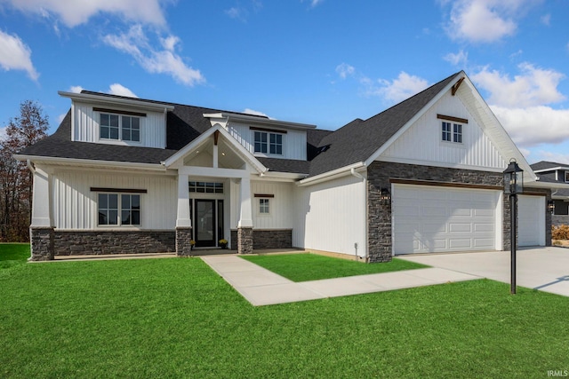 view of front facade featuring stone siding, roof with shingles, concrete driveway, and a front yard