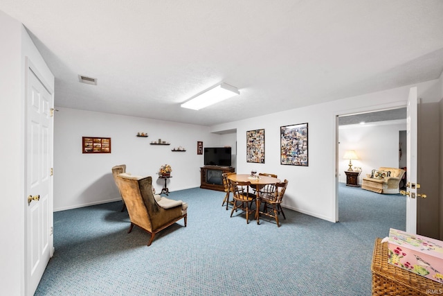 interior space featuring carpet, visible vents, and baseboards