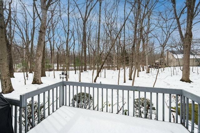 view of snow covered deck