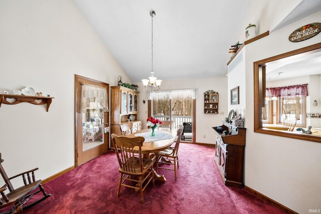 dining space featuring baseboards, carpet floors, plenty of natural light, and an inviting chandelier