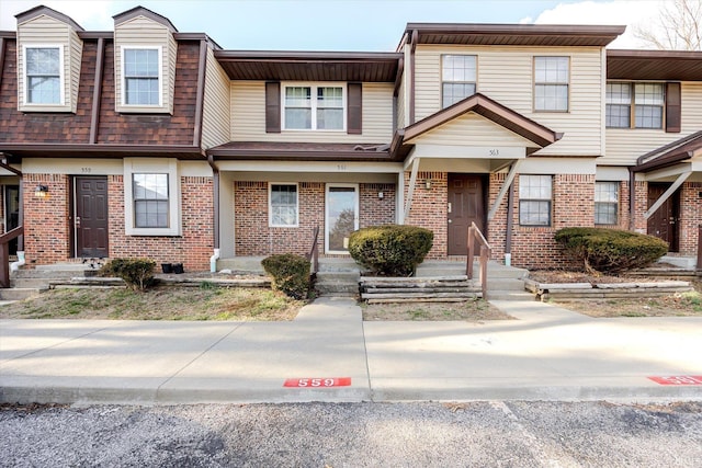 multi unit property featuring brick siding