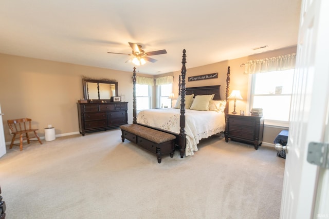 bedroom with visible vents, carpet floors, a ceiling fan, and baseboards