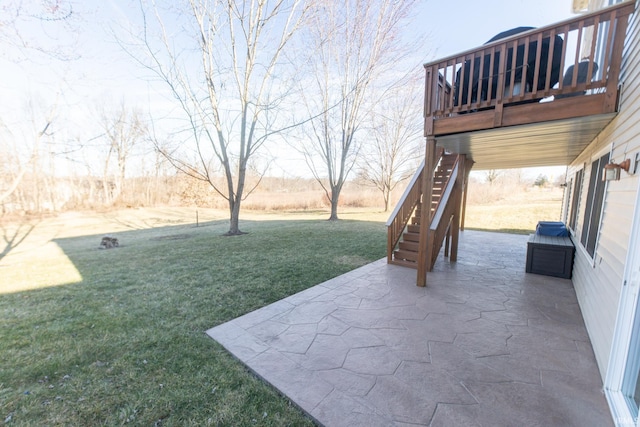 view of yard featuring stairs and a patio