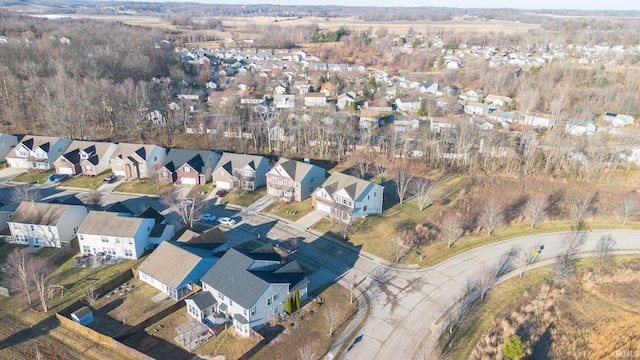 birds eye view of property with a residential view