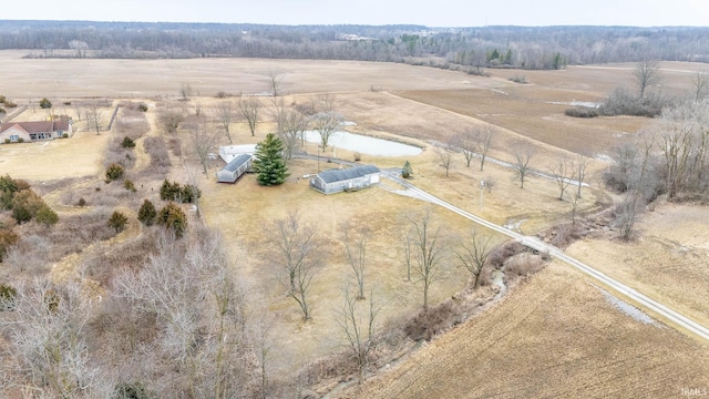 birds eye view of property featuring a rural view